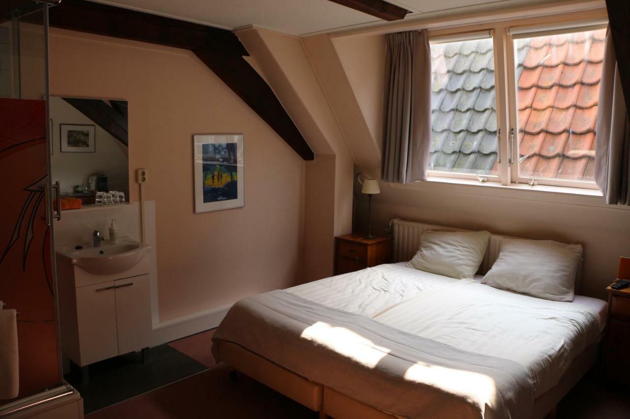 Hotel Aan De Dam Middelburg Habitación foto